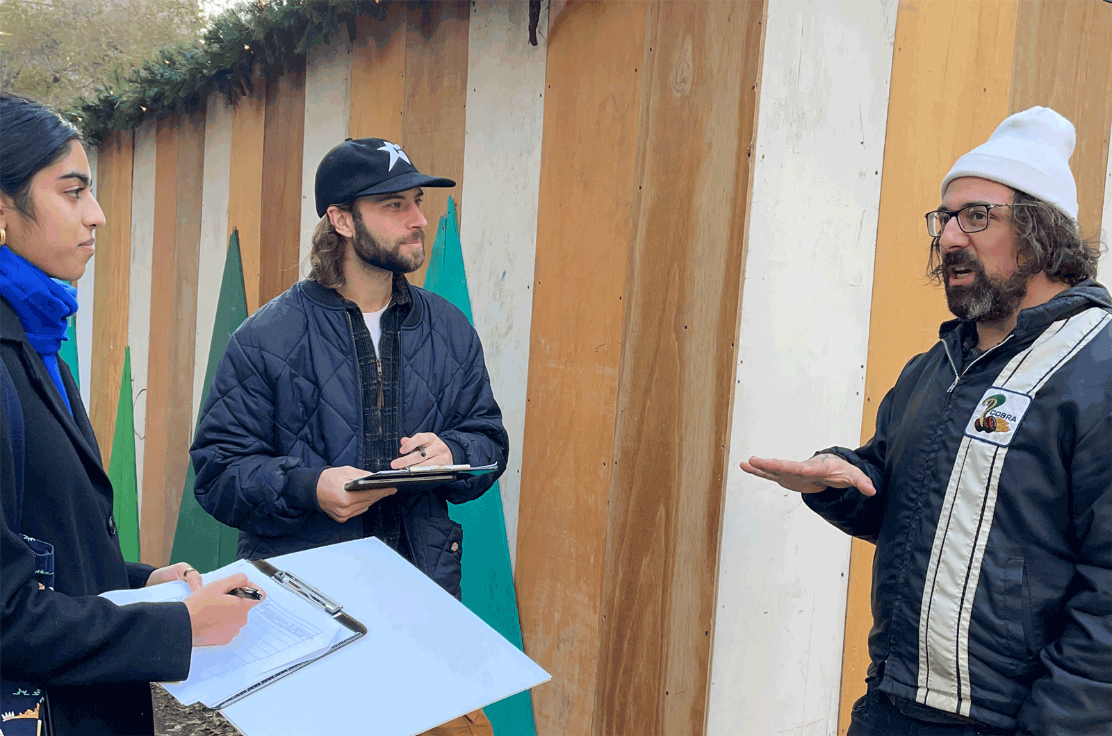 conducting interview with New York subway rdier